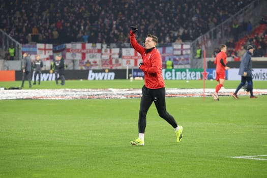 Already in a good mood during the warm-up: Michael Gregoritsch (SC Freiburg) at the match of the Football Europa League - Round of 16: SC Freiburg vs West Ham United