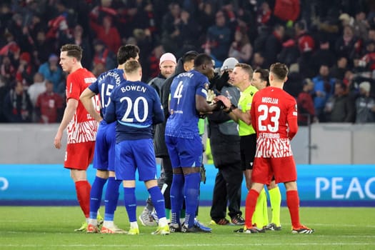 Vladimír Coufal (West Ham United) needed to talk to referee after the final whistle: Alejandro Hernandez (Spain) at the Europa League round of 16 match: SC Freiburg vs West Ham United