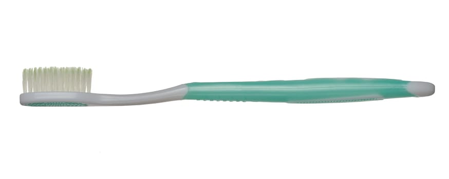 White plastic toothbrush on isolated background, close up