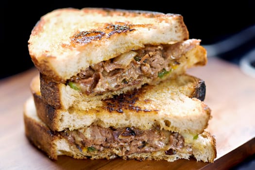 close up of a steak sandwich