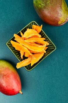 Dried and fresh mango fruit. Superfood, vegan or vegetarian.