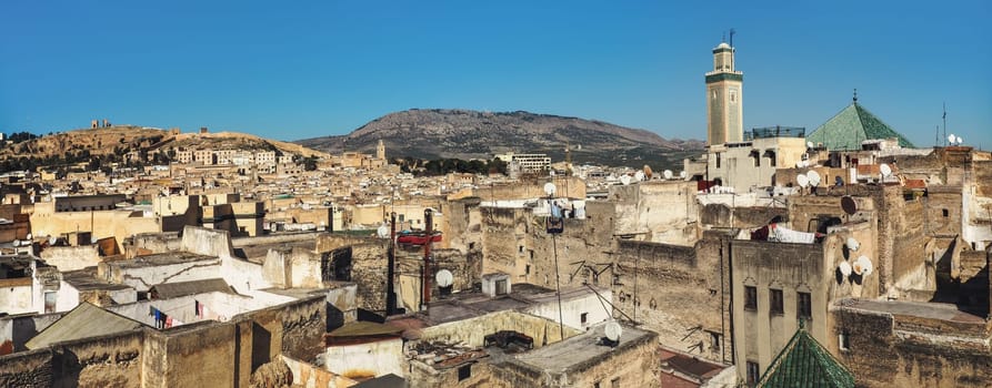 City of Fes panorama, building roofs visible with Chrabliyine Mosque tower at right side