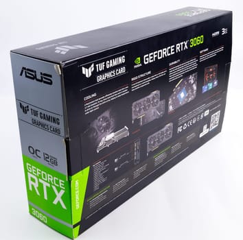 cardboard box of NVIDIA RTX 3060 OC 12g TUF gaming graphics card on white background. Tula, Russia - July 26, 2022