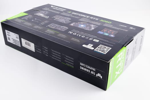 cardboard box of NVIDIA RTX 3060 OC 12g TUF gaming graphics card on white background. Tula, Russia - July 26, 2022
