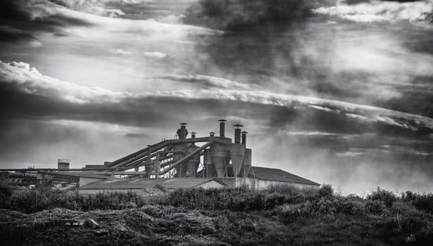 Detail of old industrial factory on a cold stormy day, pollution