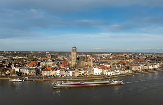 aerial panoramic shot of the Dutch city of Deventer, along the IJssel river.