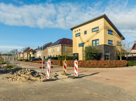 street with modern residential houses in the netherlands