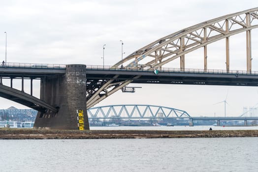 Pillar of the Waal bridge at Nijmegen, Netherlands with water level indicator