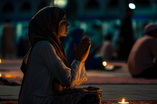 Muslim prayer woman in white clothes sitting in front of mosque at Ramadan night with selective focus. Neural network generated in January 2024. Not based on any actual scene or pattern.