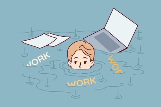 Man is drowning in work with documents and laptop, needing time management to solve problem of overwork and overload. Concept of importance of delegating authority to employees to relieve overload