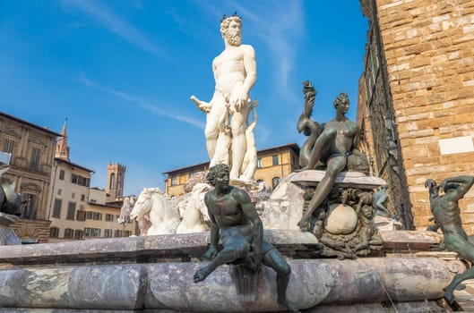 Florence, Italy - Neptune Fountain. Marble sculpture, Renaissance masterpiece, naked Poseidon statue
