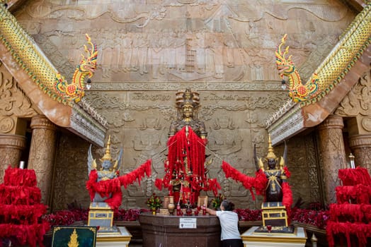 Temple guard at Wat Maha Wanaram in the city Udon Ratchathani and Province Ubon Ratchathani in Thailand.  Thailand, Ubon Ratchathani, November, 23, 2023
