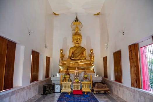 Buddha inside of Wat Luang in the city Udon Ratchathani and Province Ubon Ratchathani in Thailand.  Thailand, Ubon Ratchathani, November, 23, 2023