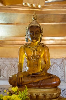 Buddha inside of Wat Luang in the city Udon Ratchathani and Province Ubon Ratchathani in Thailand.  Thailand, Ubon Ratchathani, November, 23, 2023
