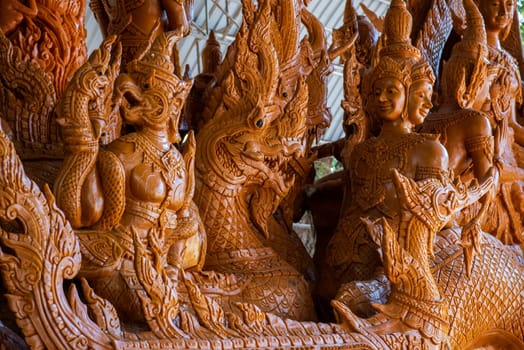 a detail of a real carve Wax candle of the Wax Candle Festival in city centre of Udon Ratchathani and Province Ubon Ratchathani in Thailand.  Thailand, Ubon Ratchathani, November, 24, 2023