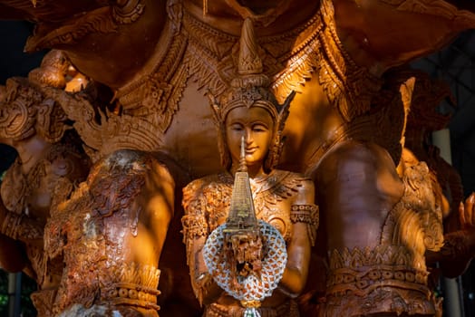 a detail of a real carve Wax candle of the Wax Candle Festival in city centre of Udon Ratchathani and Province Ubon Ratchathani in Thailand.  Thailand, Ubon Ratchathani, November, 24, 2023
