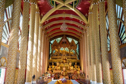 Buddha inside the Wat Phra That Nong Bua Temple in city centre and Province Ubon Ratchathani in Thailand.  Thailand, Ubon Ratchathani, November, 24, 2023