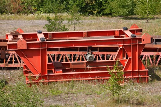 Red detail of a combine harvester in a field, Germany