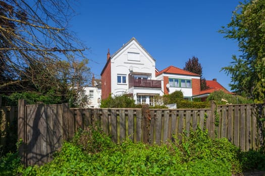 Old residential building with garden fence, Leer, East Frisia, Lower Saxony, Germany