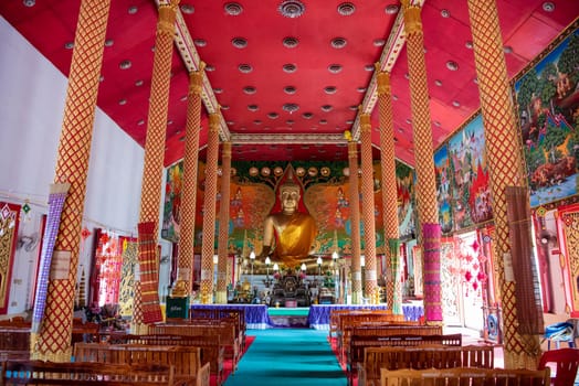 Buddha inside of the Wat Jaeng in the city centre of Udon Ratchathani and Province Ubon Ratchathani in Thailand.  Thailand, Ubon Ratchathani, November, 25, 2023