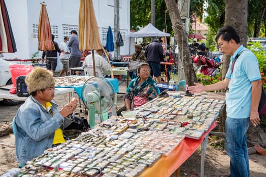 a Thai Amulet market in the city centre of Udon Ratchathani and Province Ubon Ratchathani in Thailand.  Thailand, Ubon Ratchathani, November, 25, 2023