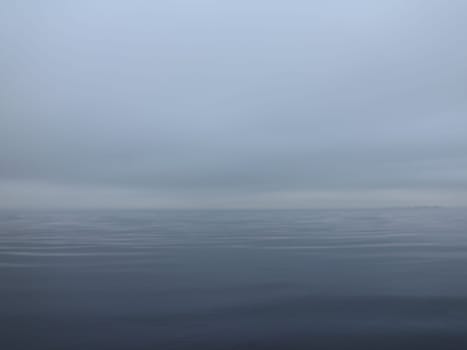 thick white fog over a calm sea, calm, silence, nothing visible, gradient background