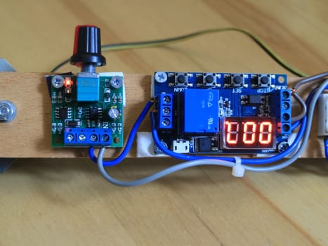 electronic actuators variable resistor and mechanical relay with timer close-up