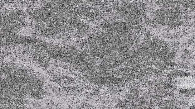 Rough mottled gray surface close-up