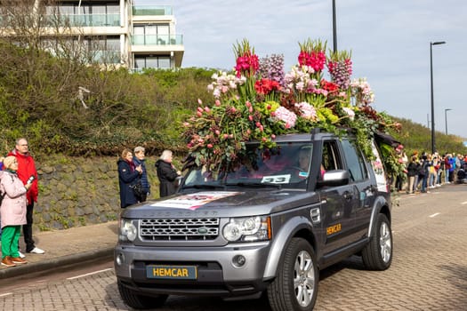 Noordwijk, Netherlands - April 22, 2023: Spectacular flower covered floats in the Bloemencorso Bollenstreek the annual spring flower parade from Noordwijk to Haarlem in the Netherlands.