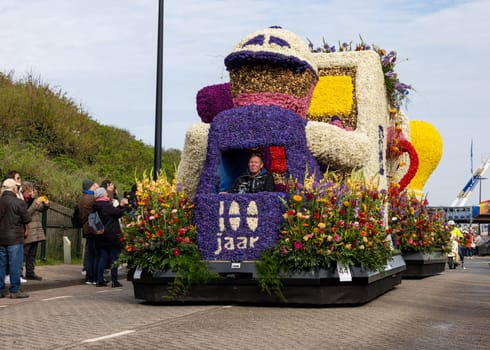 Noordwijk, Netherlands - April 22, 2023: Spectacular flower covered floats in the Bloemencorso Bollenstreek the annual spring flower parade from Noordwijk to Haarlem in the Netherlands.