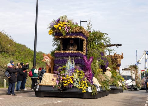 Noordwijk, Netherlands - April 22, 2023: Spectacular flower covered floats in the Bloemencorso Bollenstreek the annual spring flower parade from Noordwijk to Haarlem in the Netherlands.