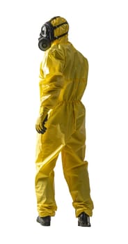 Professional hazmat suit worker standing in full body yellow protective gear with gas mask