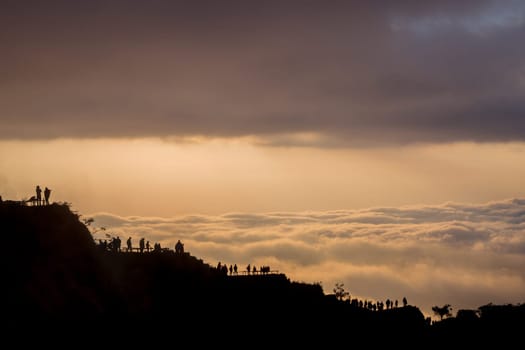 Scenic view of clouds and mist at sunrise from the top of mount Batur (Kintamani volcano), Bali, Indonesia