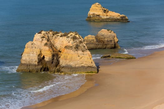 The famous beach of Praia da Rocha in Portimao. This beach is a part of famous tourist region of Algarve.