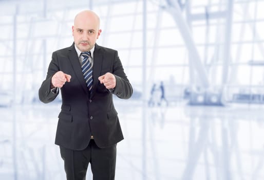 young business man pointing, at the office