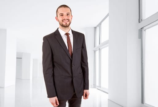 young business man portrait at the office