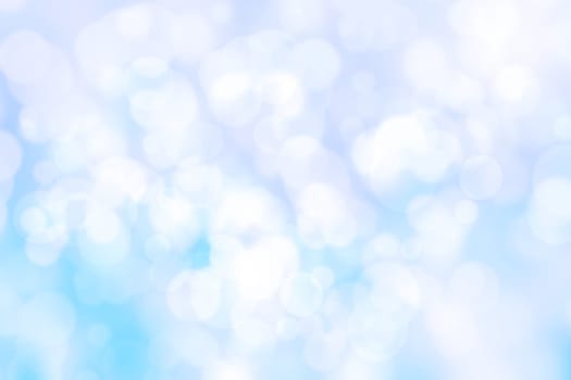 Abstract blurred fresh vivid spring summer light delicate pastel blue turquoise white bokeh background texture with bright circular soft color lights. Card concept. Beautiful backdrop illustration.