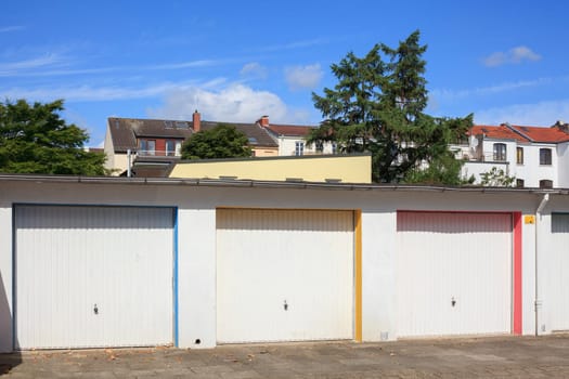 Colorful garages with residential buildings, Bremen, Germany