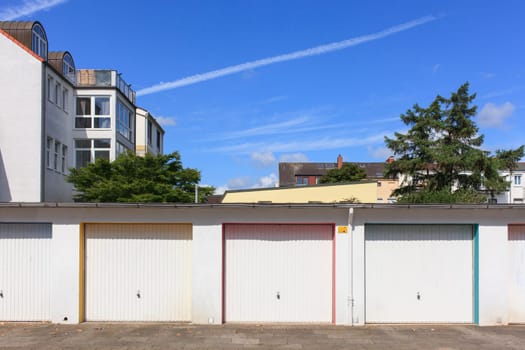 Colorful garages with residential buildings, Bremen, Germany