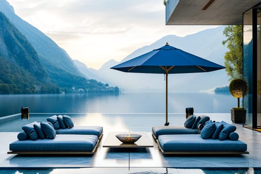 Luxury outdoor lounge with a view of calm waters and mountains. Copy space available.for luxury travel and real estate.