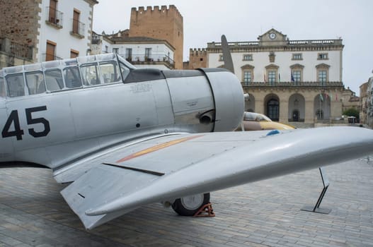 Caceres, Spain - May 27th, 2021: North American Aviation T-6 Texan. Spanish military aviation exhibition. Caceres main square, Spain