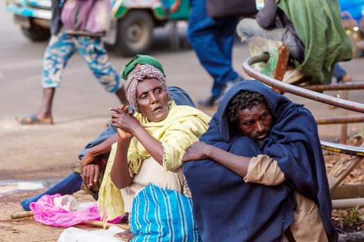 Bahir Dar, Ethiopia - April 21st, 2019: Beggar woman on the street during Easter holidays. April 21th. 2019, Bahir Dar, Etiopia