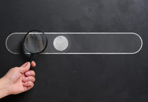 Chalk-drawn internet search bar and a female hand, close up