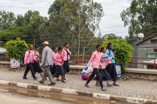 GONDAR, ETHIOPIA, APRIL 22.2019, Ethiopian students in uniform behind Fasiledes secondary school in Gondar City. Gondar, Ethiopia, April 22. 2019