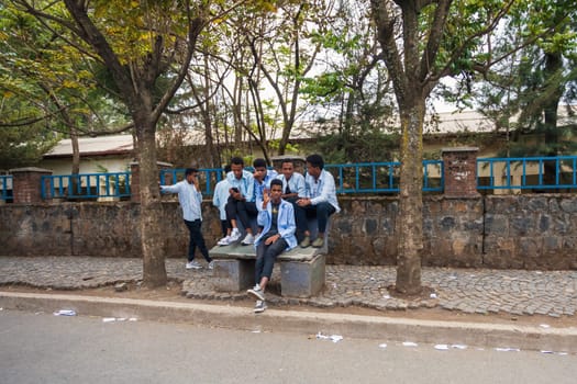 GONDAR, ETHIOPIA, APRIL 22.2019, Ethiopian students in uniform behind Fasiledes secondary school in Gondar City. Gondar, Ethiopia, April 22. 2019