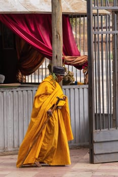 AKSUM, ETHIOPIA, APRIL 27.2019, Old orthodox priest in front of Church of Our Lady of Zion on April 27, 2019 in Aksum, Ethiopia, Africa
