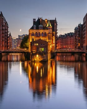 HAMBURG, GERMANY - AUGUST 21, 2023: Historic buildings in the warehouse district of Hamburg on August 21, 2023 in Germany