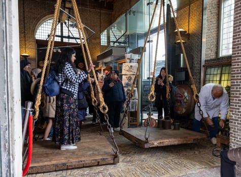 Gouda, the Nehterlands - April 20, 2023: Waag - historic municipal scale for weighing cheese in Gouda. the Nehterlands