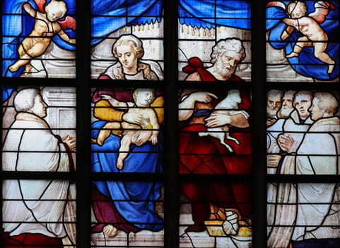 Gouda, the Nehterlands - April 20, 2023: The Stained glass number 11 - Birth of John the Baptist by Lambert van Noort  in the Sint Janskerk