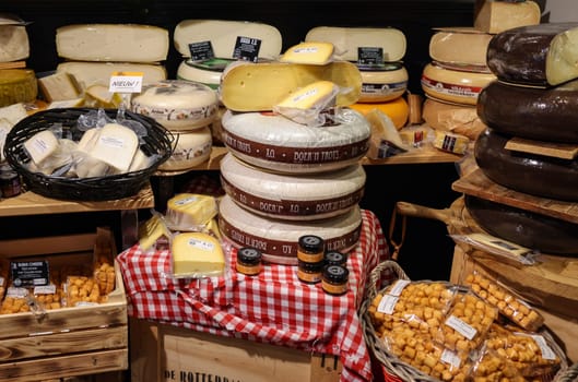 Gouda, the Nehterlands - April 20, 2023: Display of traditional Dutch cheese at local cheese shop in Gouda, the Netherlands